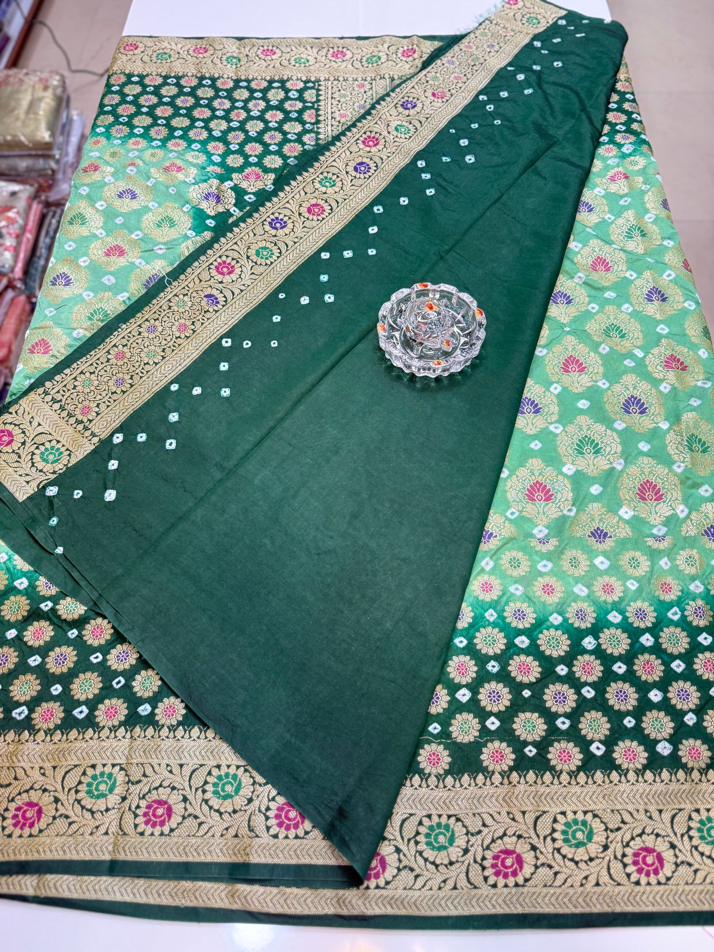 Banarasi dupiyan bandhani saree with semi-weaving neemjari work and hand chunri craftsmanship