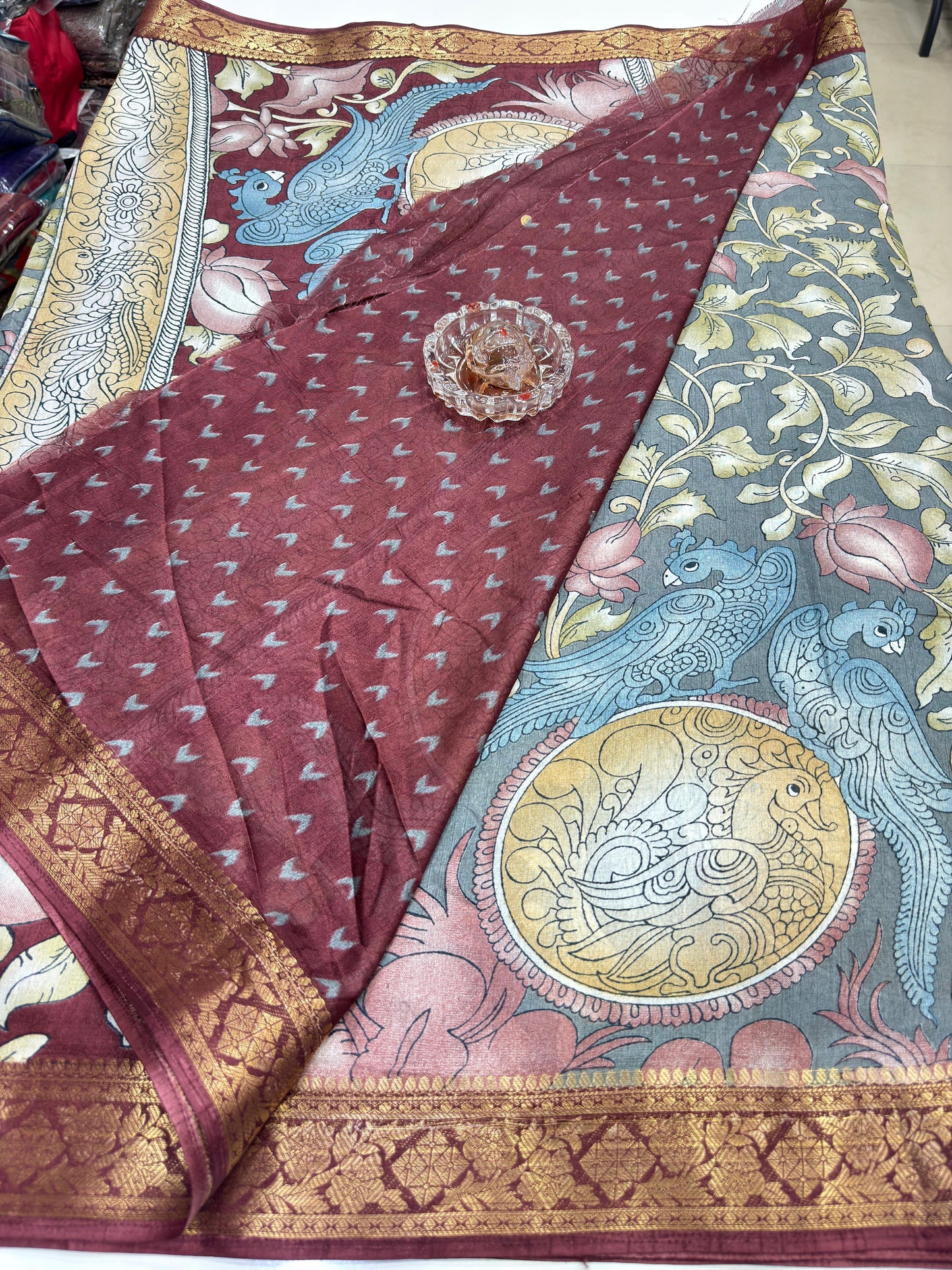 Silk blend printed saree with floral and bird motifs, zari border, women’s festive wear saree