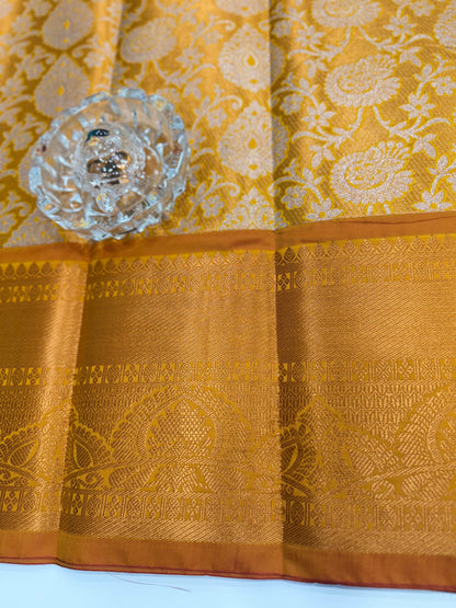 Bridal tissue saree for women with woven zari work and contrast border, kanchipuram style powerloom saree with blouse fabric