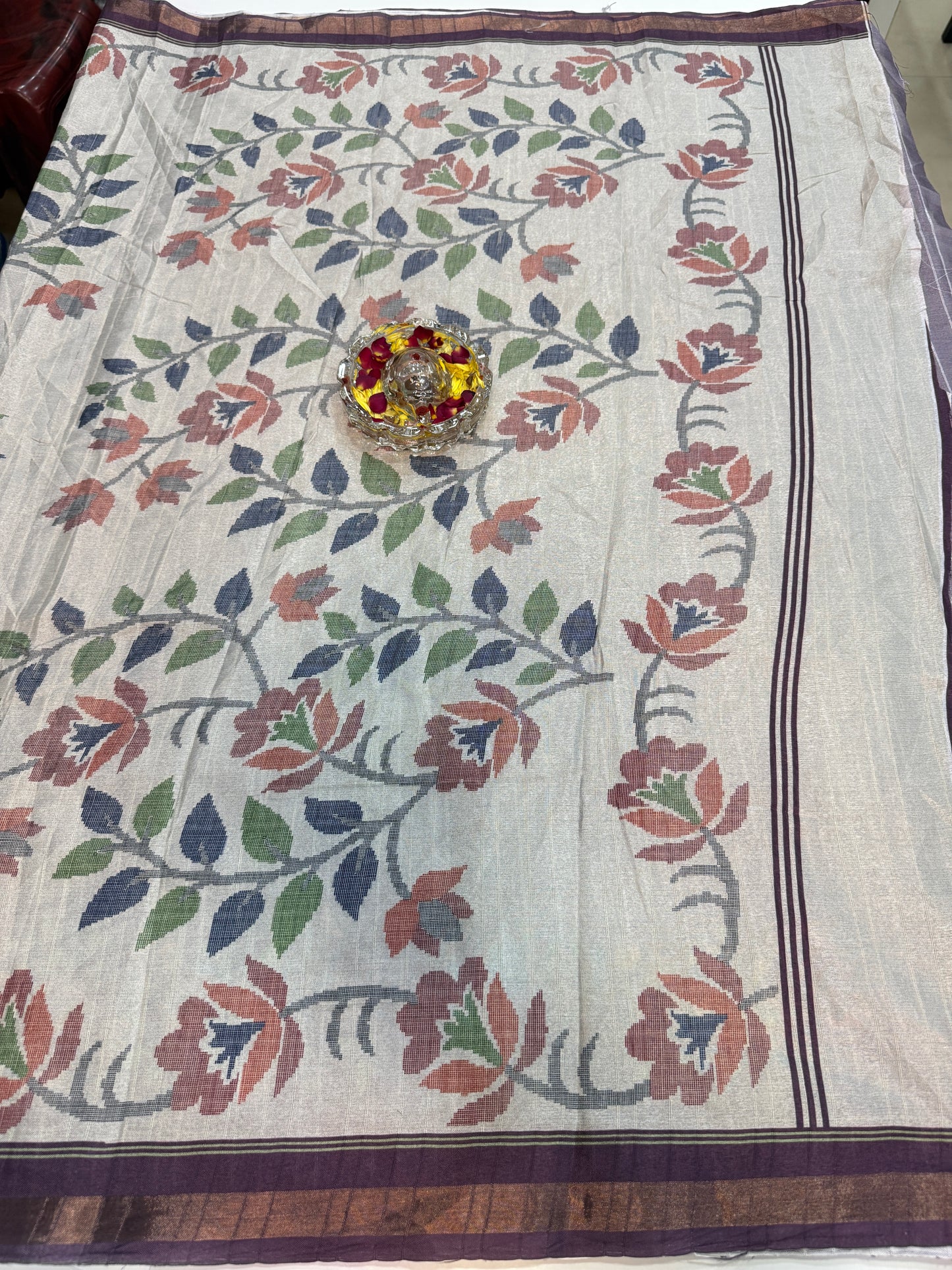 Raw tussar silk saree with smart floral design and soft marmo finish, printed border saree