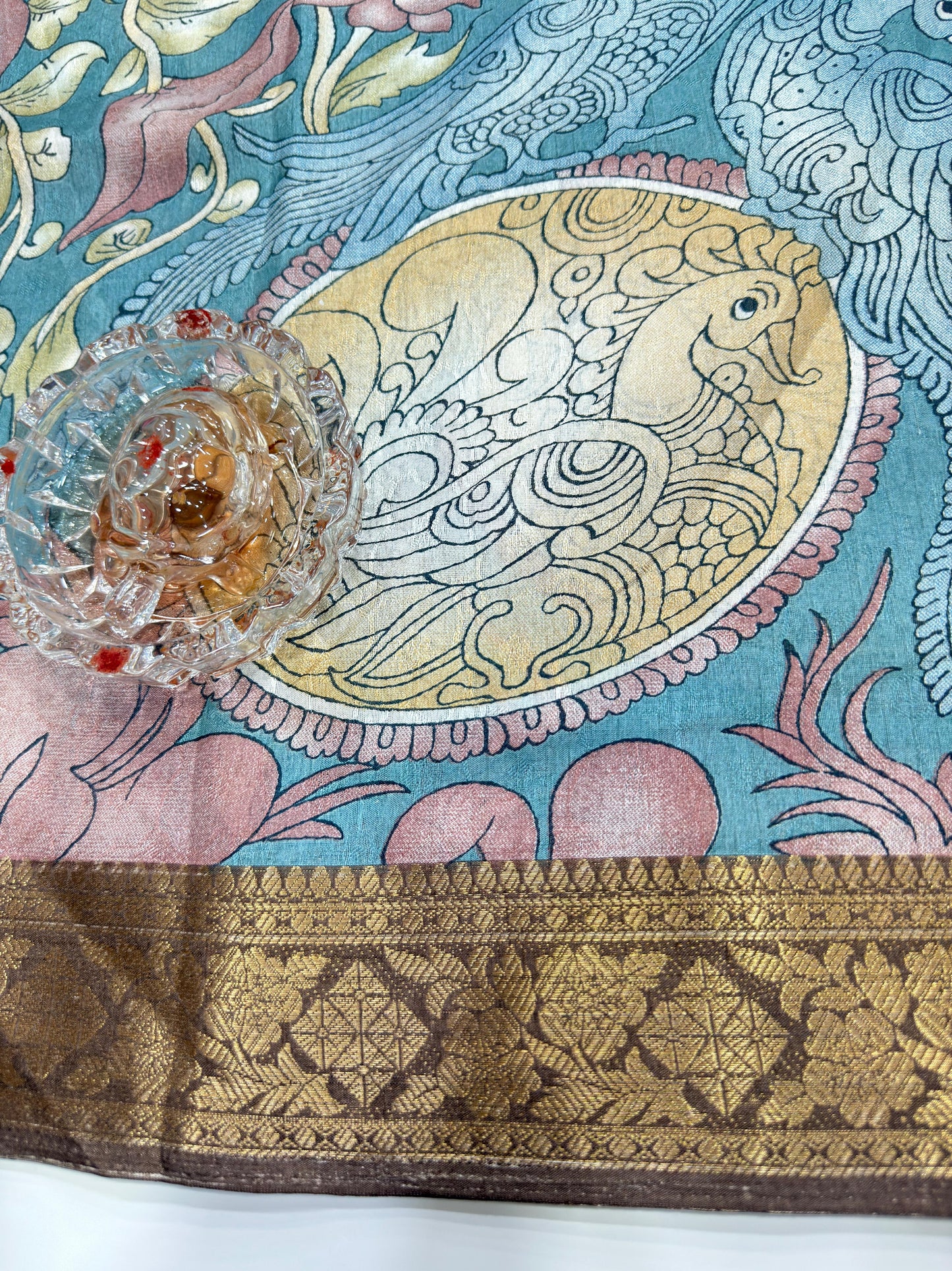 Silk blend printed saree with floral and bird motifs, zari border, women’s festive wear saree