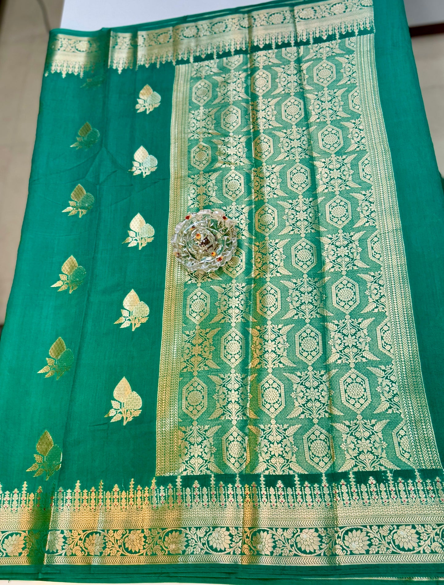 Handloom Pure Chhiniya Silk Saree in bottle green with Meenakari Zari Weaving and Buta Work
