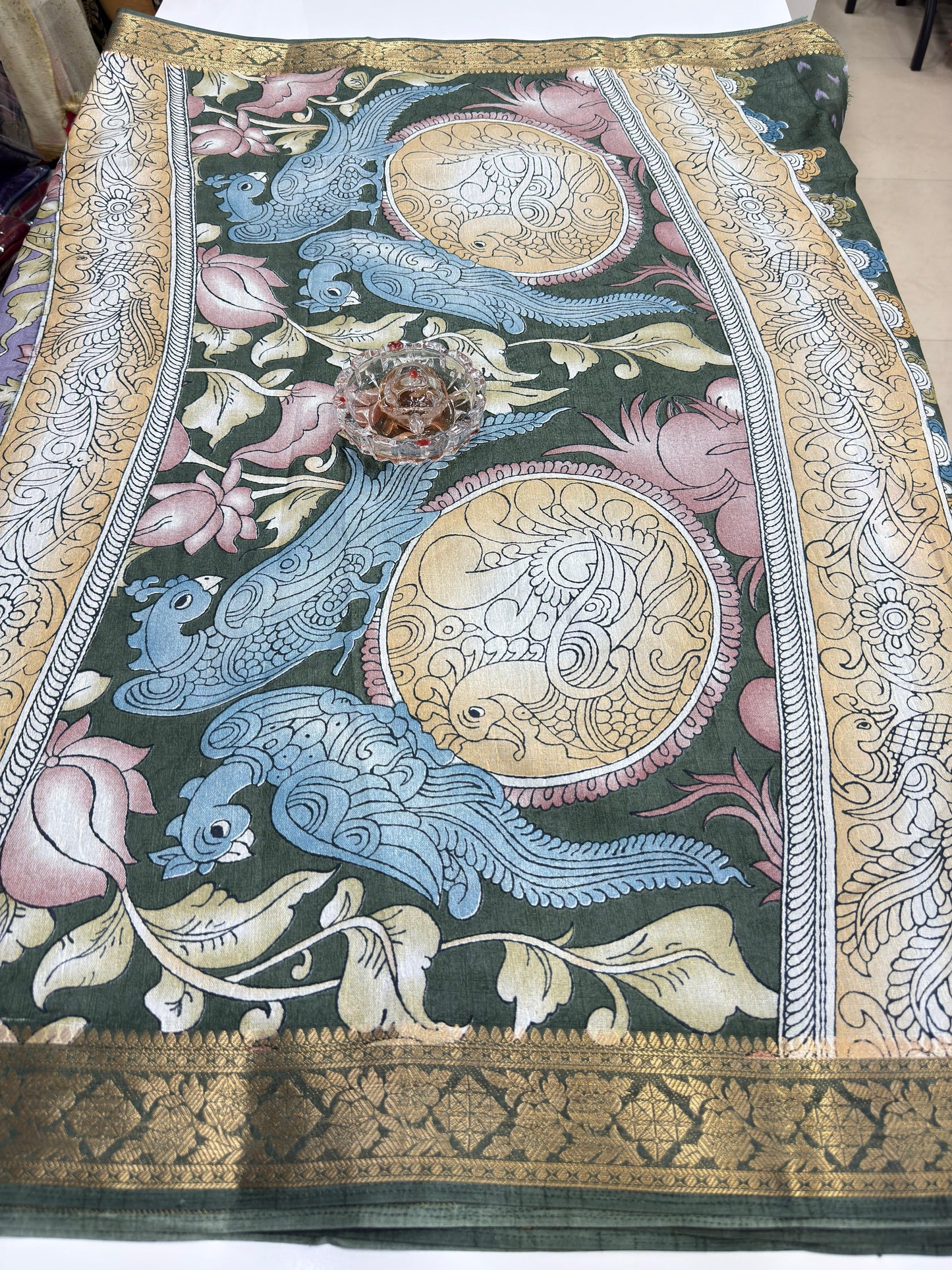 Silk blend printed saree with floral and bird motifs, zari border, women’s festive wear saree