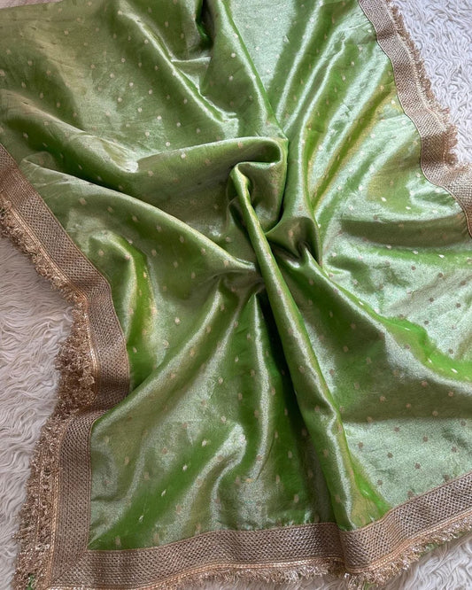 Banarasi Tissue Silk Saree, adorned with exquisite broad shiny lace