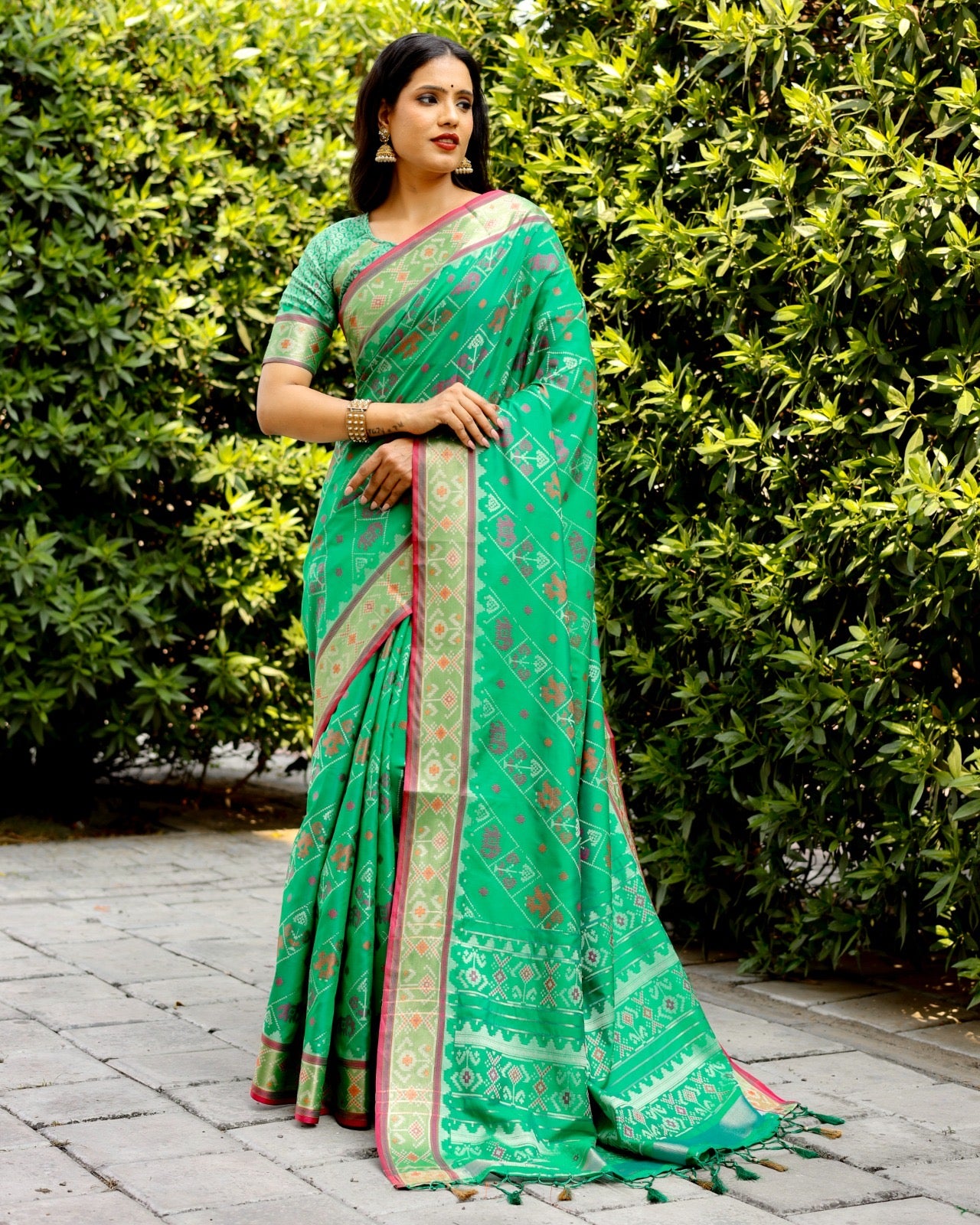 Ikkat Patola Silk Saree with Contrast Zari Weaving and Kanchi Borders – Festive Wear