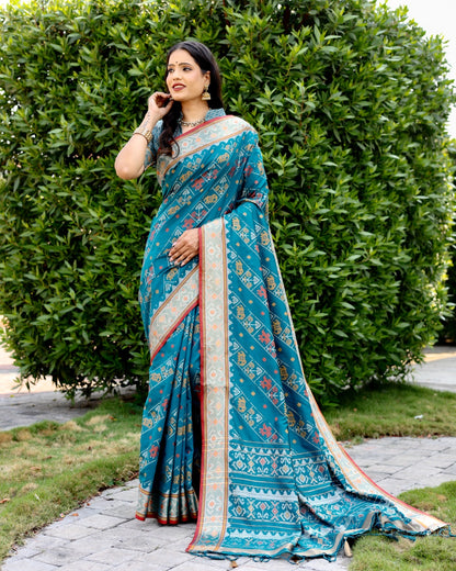 Ikkat Patola Silk Saree with Contrast Zari Weaving and Kanchi Borders – Festive Wear