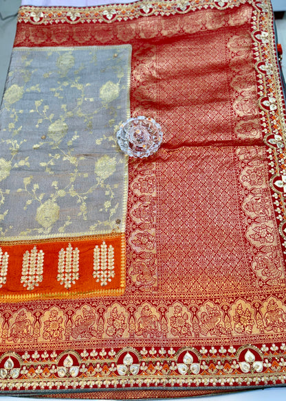 Pure Dola silk saree with position weaving and embroidered blouse – premium ethnic wear for weddings and festive occasions