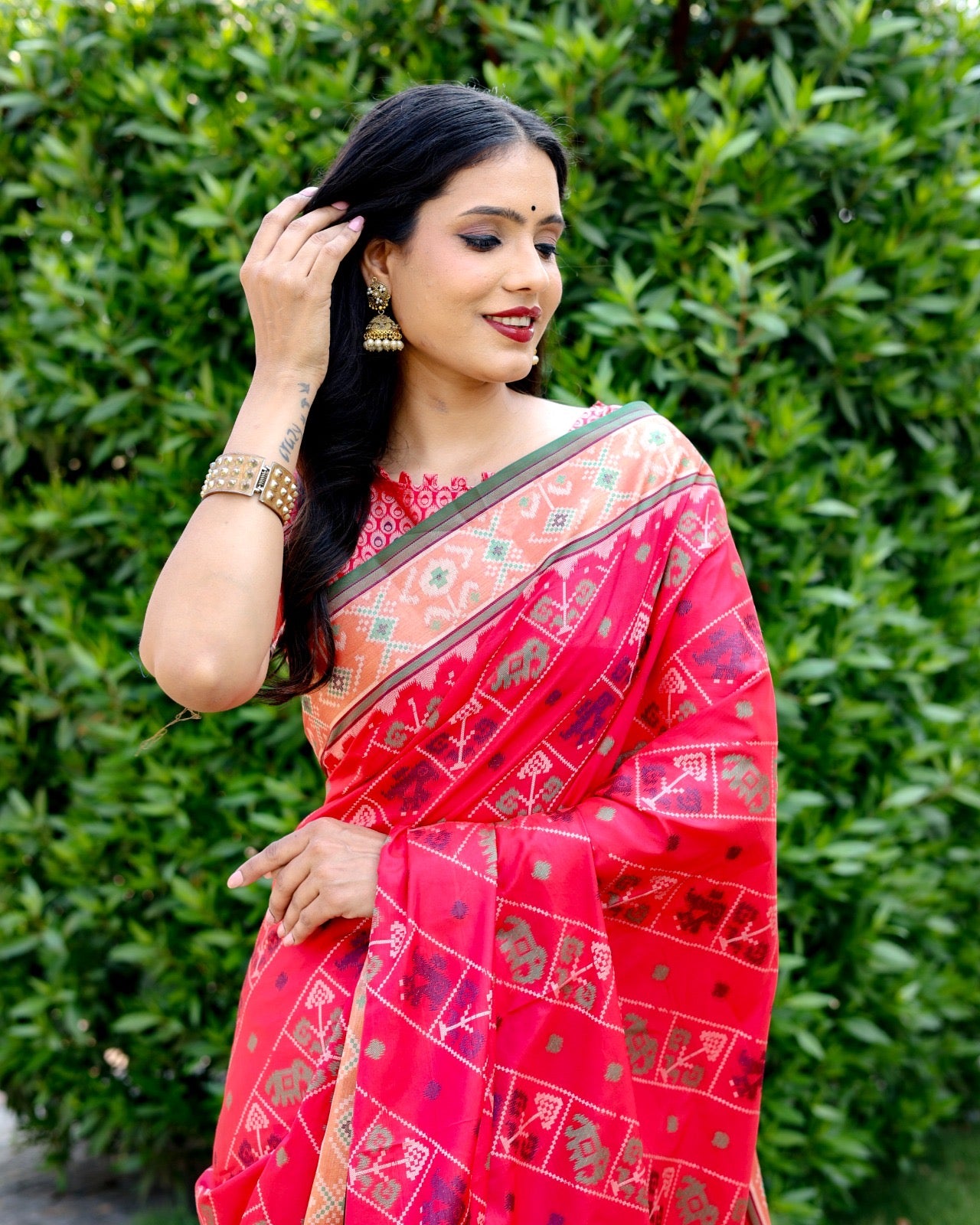 Ikkat Patola Silk Saree with Contrast Zari Weaving and Kanchi Borders – Festive Wear