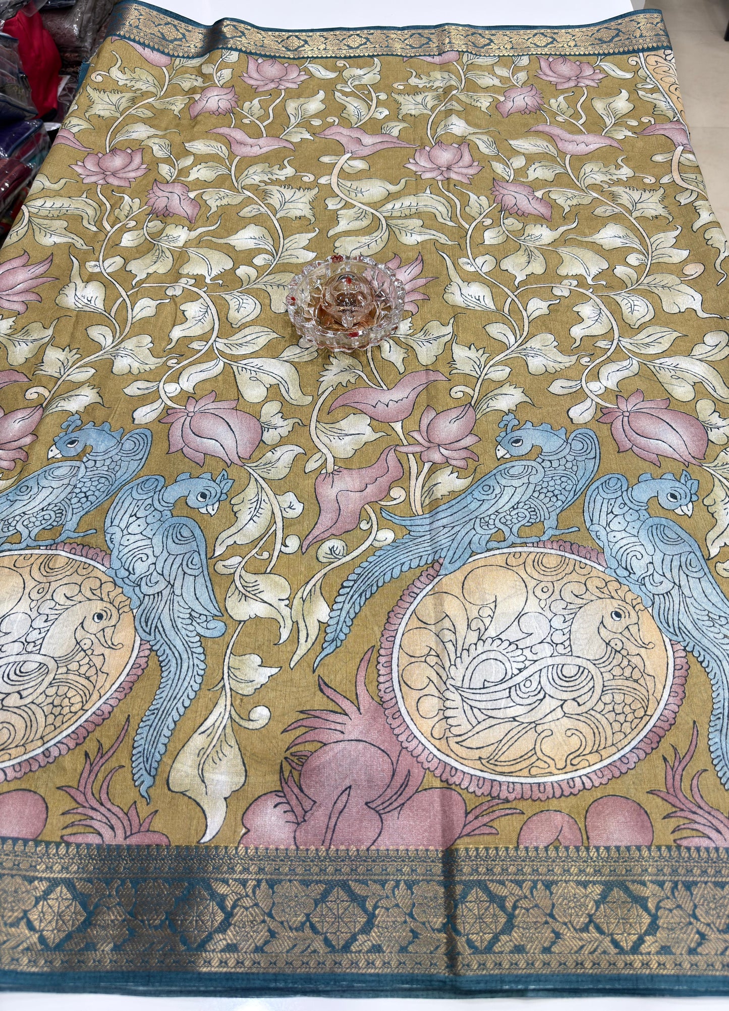 Silk blend printed saree with floral and bird motifs, zari border, women’s festive wear saree