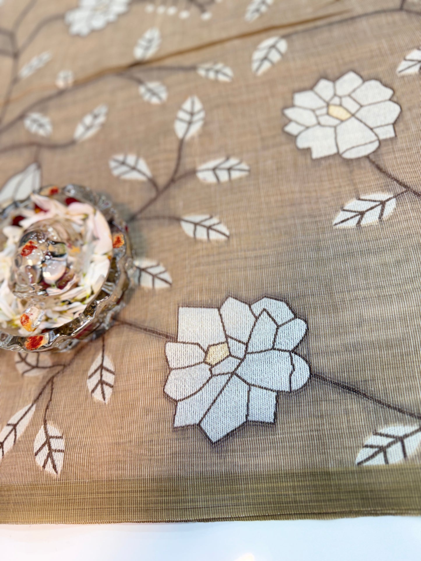 Linen printed saree with floral vine design, contrast border and tassel pallu, women’s daily wear saree