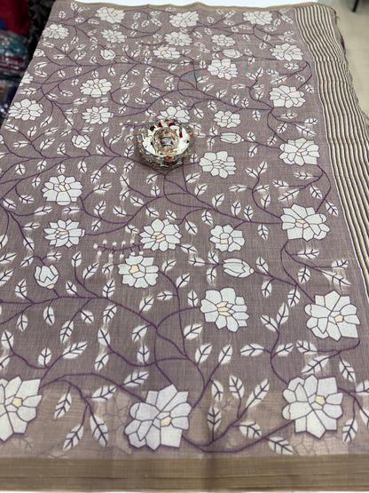 Linen printed saree with floral vine design, contrast border and tassel pallu, women’s daily wear saree