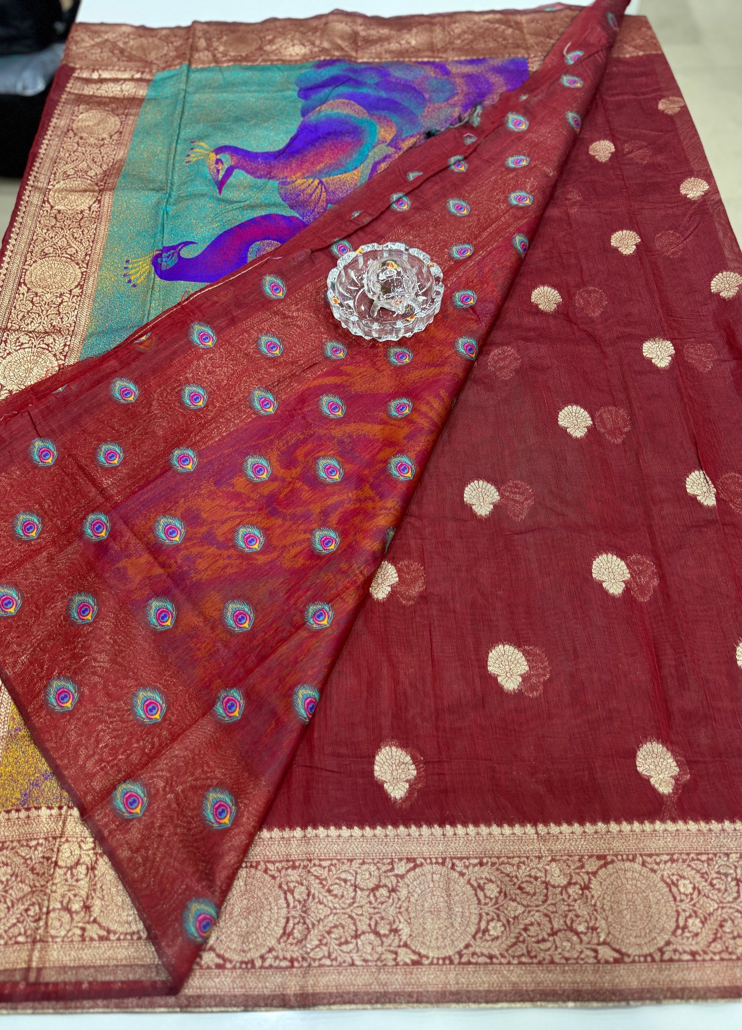 Modal silk saree with woven buttas and peacock pallu for women