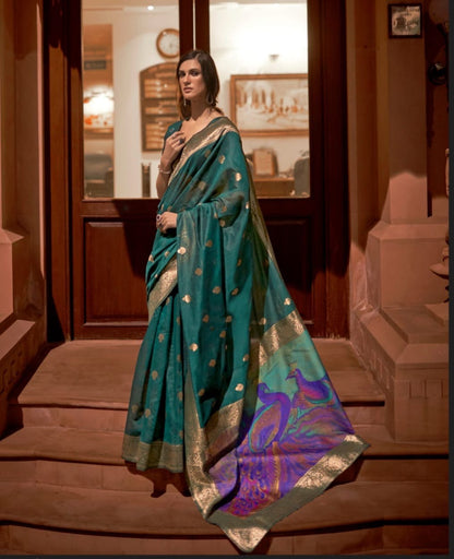 Modal silk saree with woven buttas and peacock pallu for women
