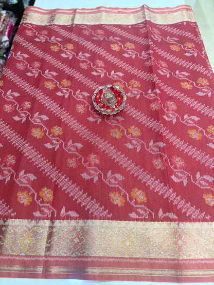 Women’s ikat style woven saree with contrast border and tassel pallu