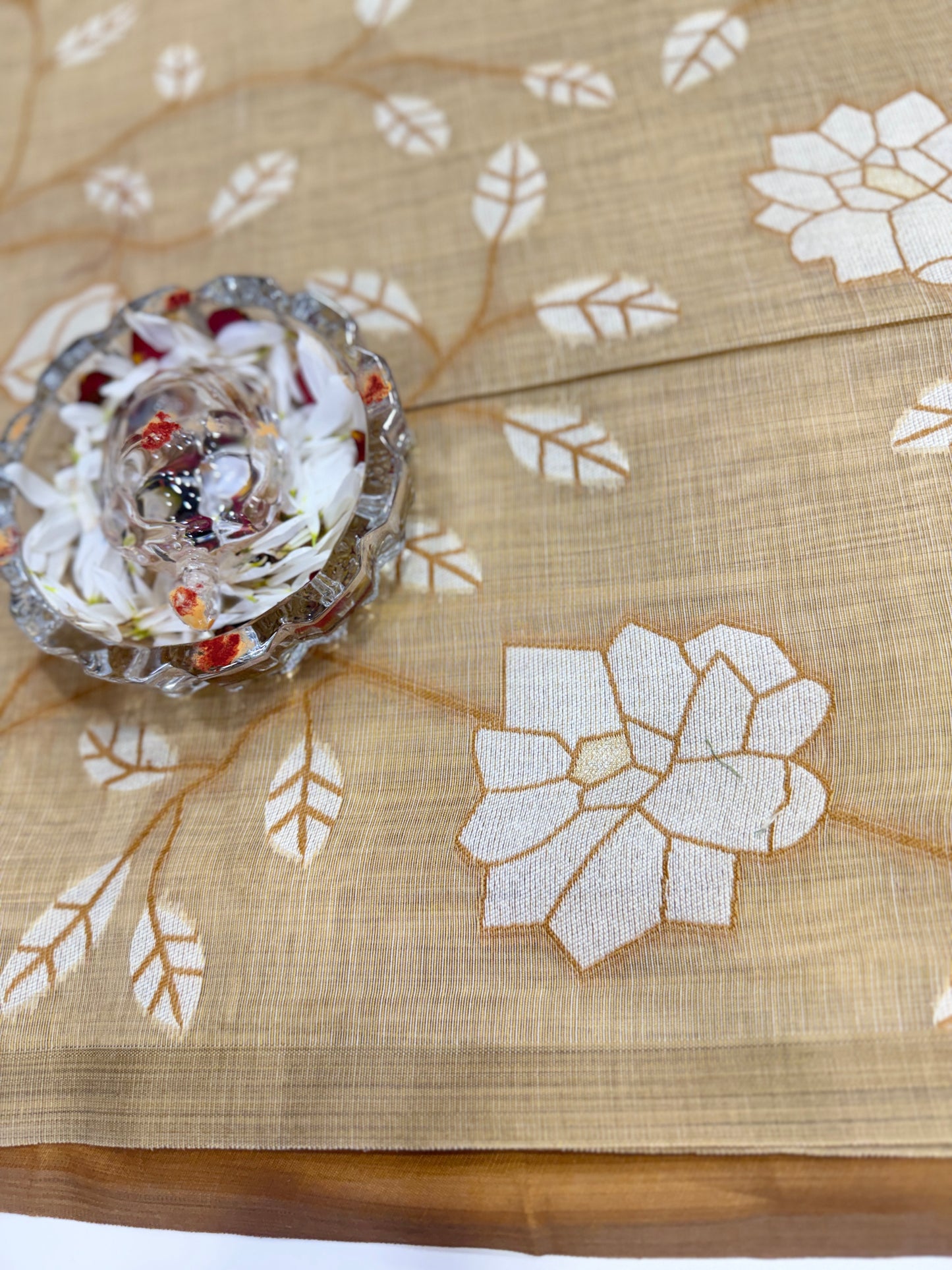 Linen printed saree with floral vine design, contrast border and tassel pallu, women’s daily wear saree