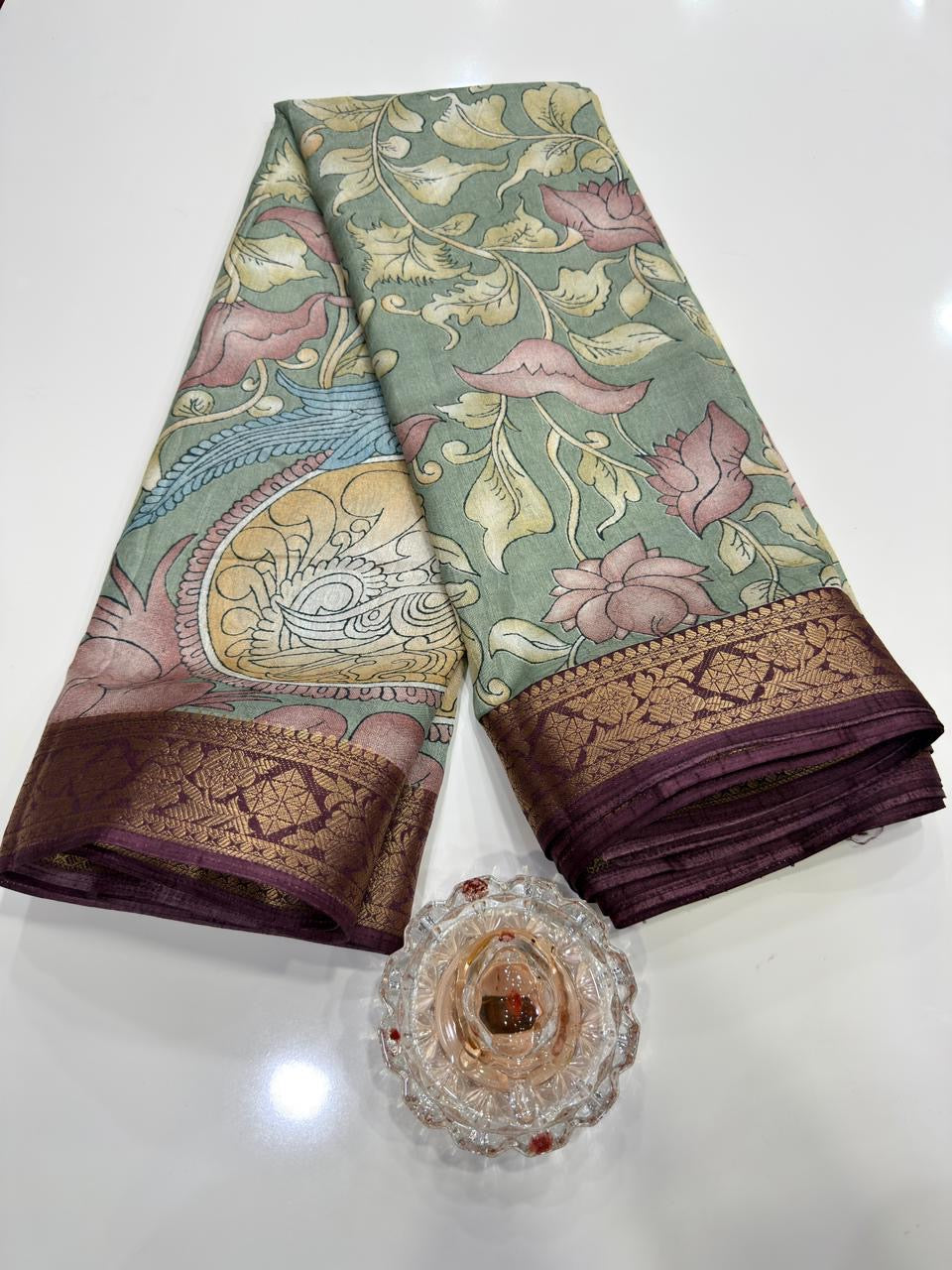 Silk blend printed saree with floral and bird motifs, zari border, women’s festive wear saree