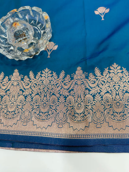 Soft silk saree with woven floral border and contrast brocade blouse piece