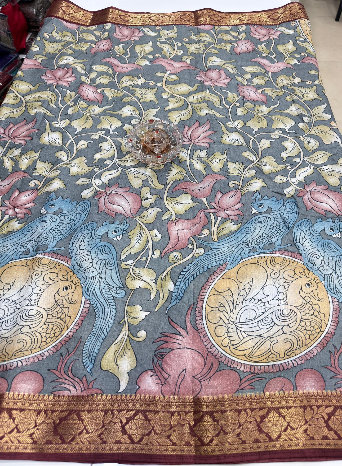 Silk blend printed saree with floral and bird motifs, zari border, women’s festive wear saree