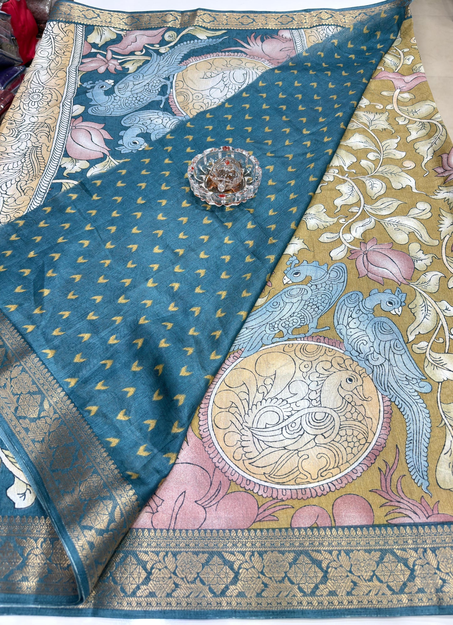 Silk blend printed saree with floral and bird motifs, zari border, women’s festive wear saree