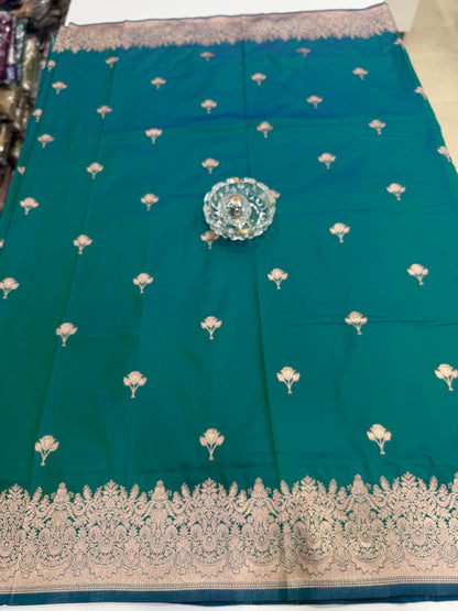 Soft silk saree with woven floral border and contrast brocade blouse piece