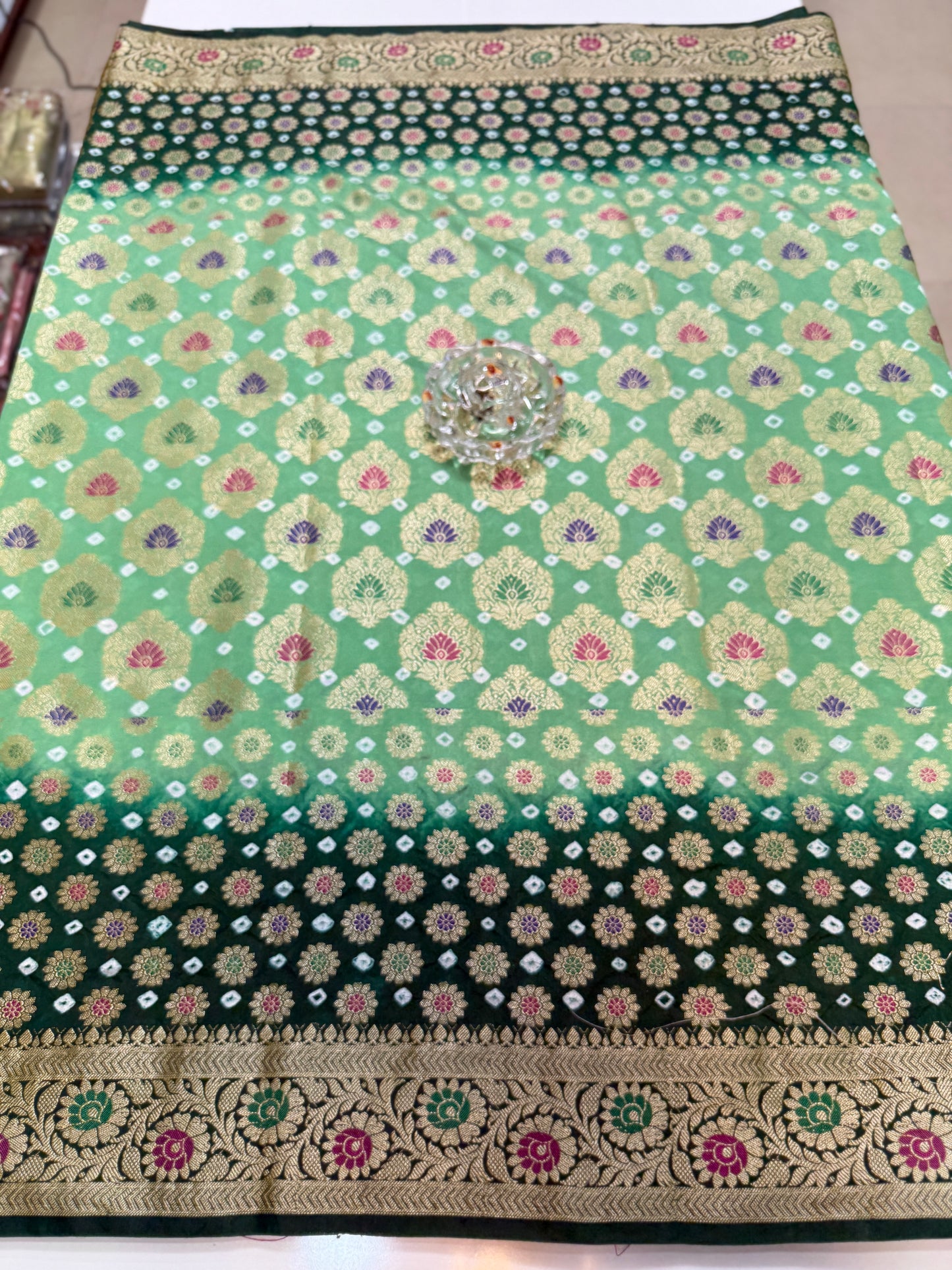 Banarasi dupiyan bandhani saree with semi-weaving neemjari work and hand chunri craftsmanship