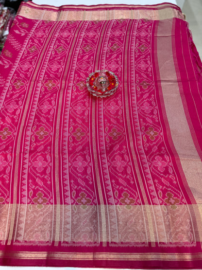 Women’s ikat style woven saree with contrast border and tassel pallu