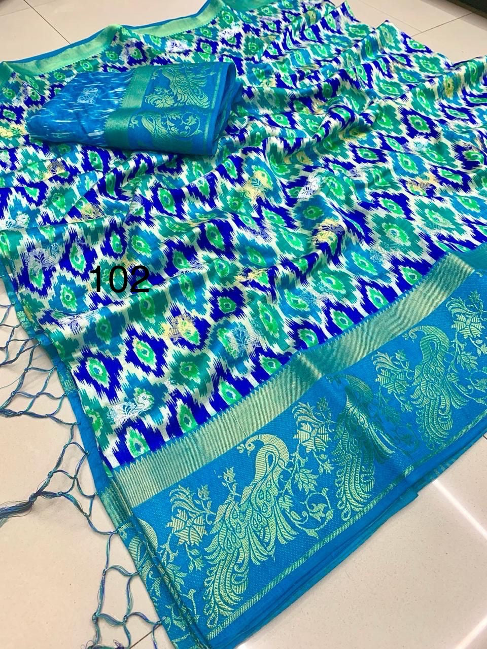 Semi Raw Silk Jacquard Saree with Silver and Gold Zari Butti Weaving – Contrast Ikkat Blouse