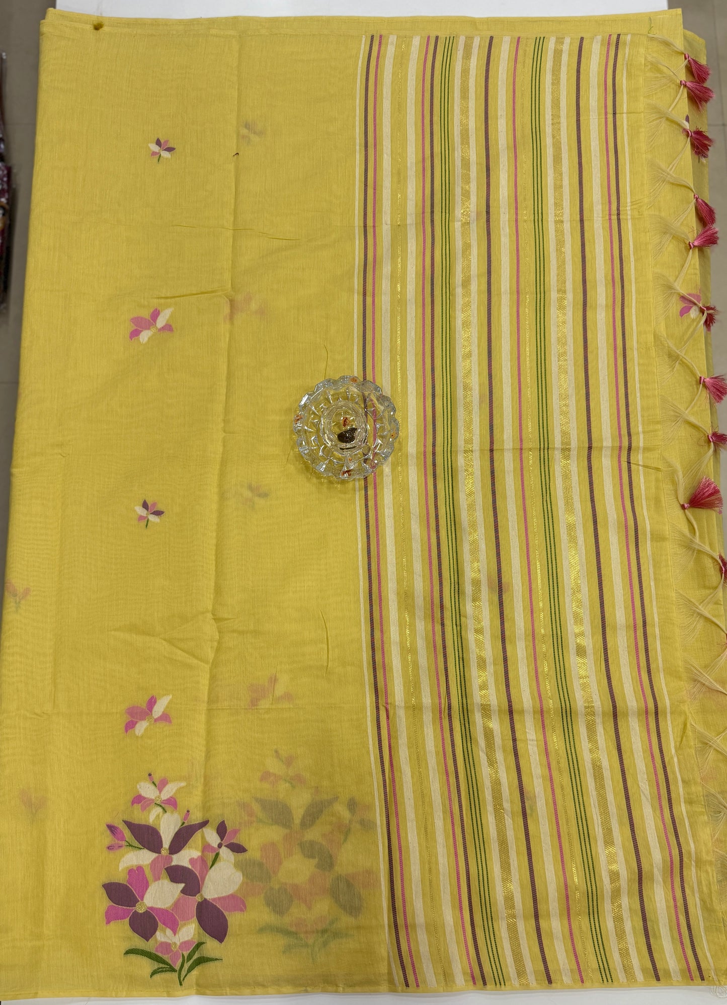 Yellow kora silk style viscose saree with woven floral motifs, tassel pallu and embroidered unstitched blouse fabric for women