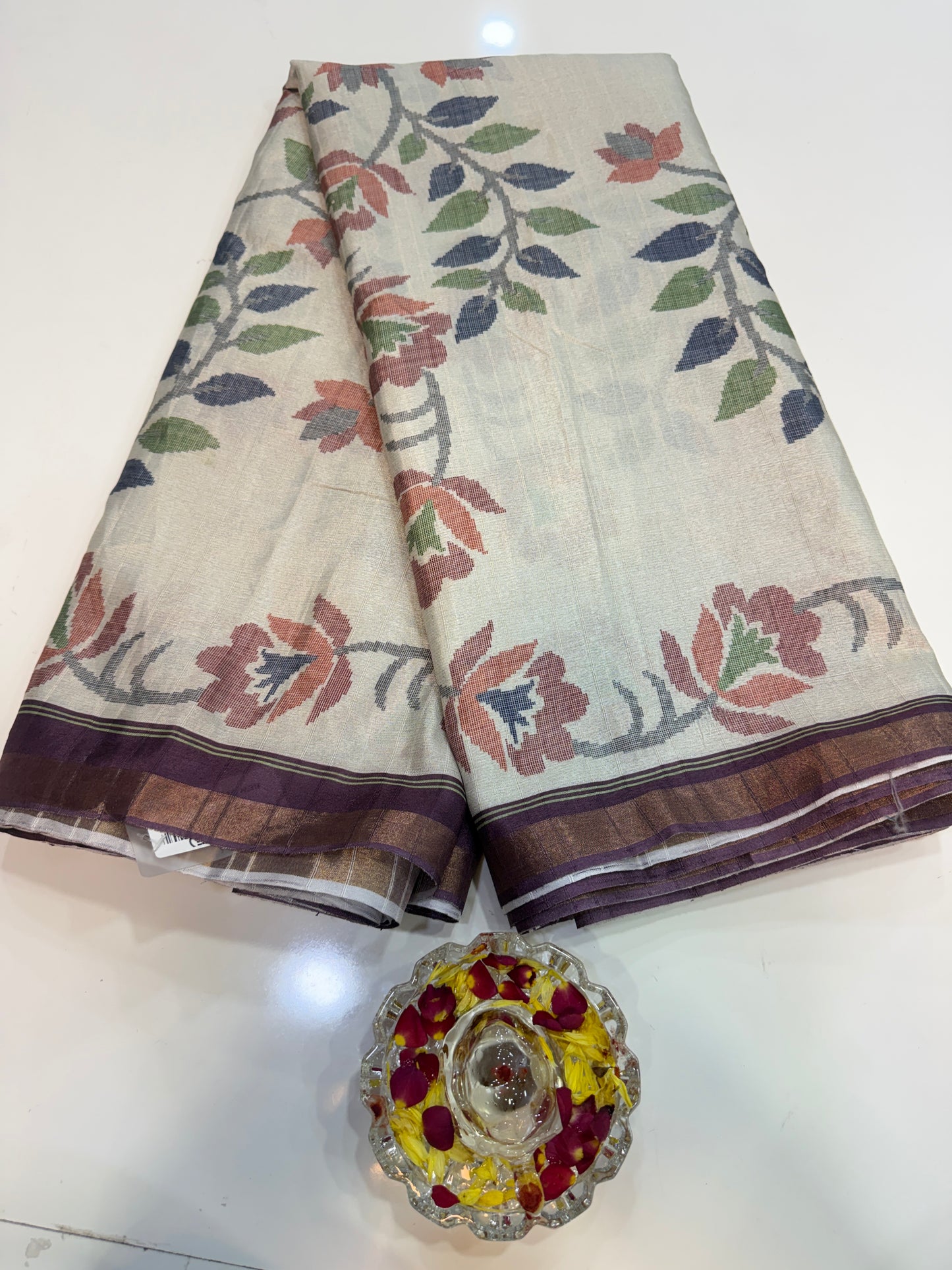 Raw tussar silk saree with smart floral design and soft marmo finish, printed border saree