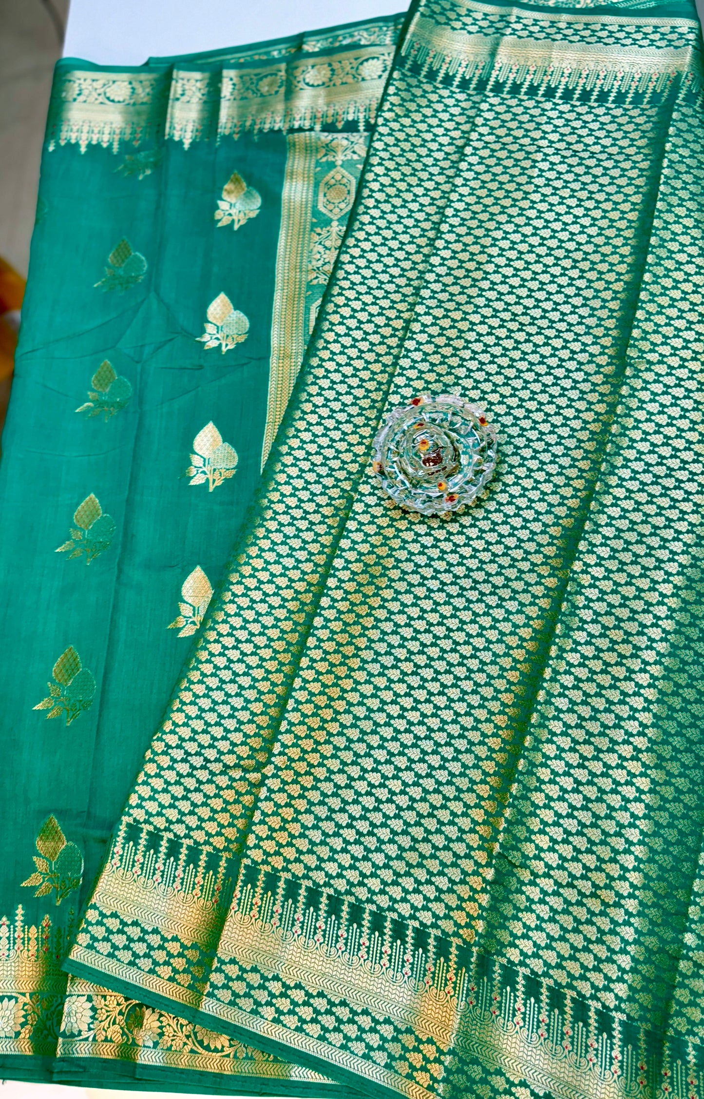Handloom Pure Chhiniya Silk Saree in bottle green with Meenakari Zari Weaving and Buta Work