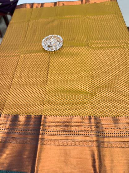 Kanchipuram Style Silk Saree with Rich Zari Border – Festive Wear