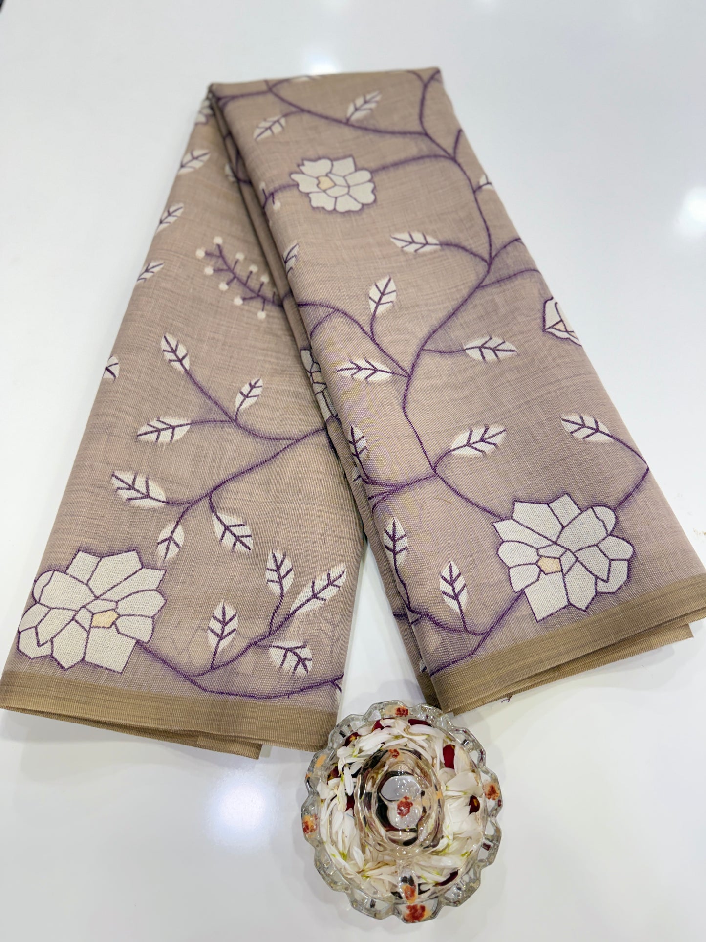 Linen printed saree with floral vine design, contrast border and tassel pallu, women’s daily wear saree