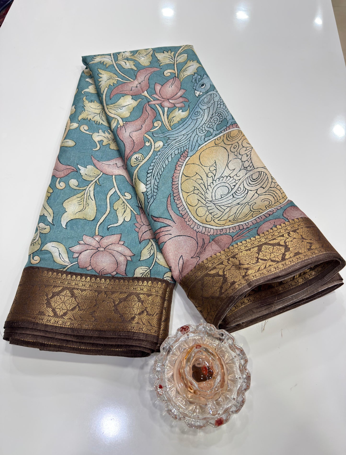 Silk blend printed saree with floral and bird motifs, zari border, women’s festive wear saree