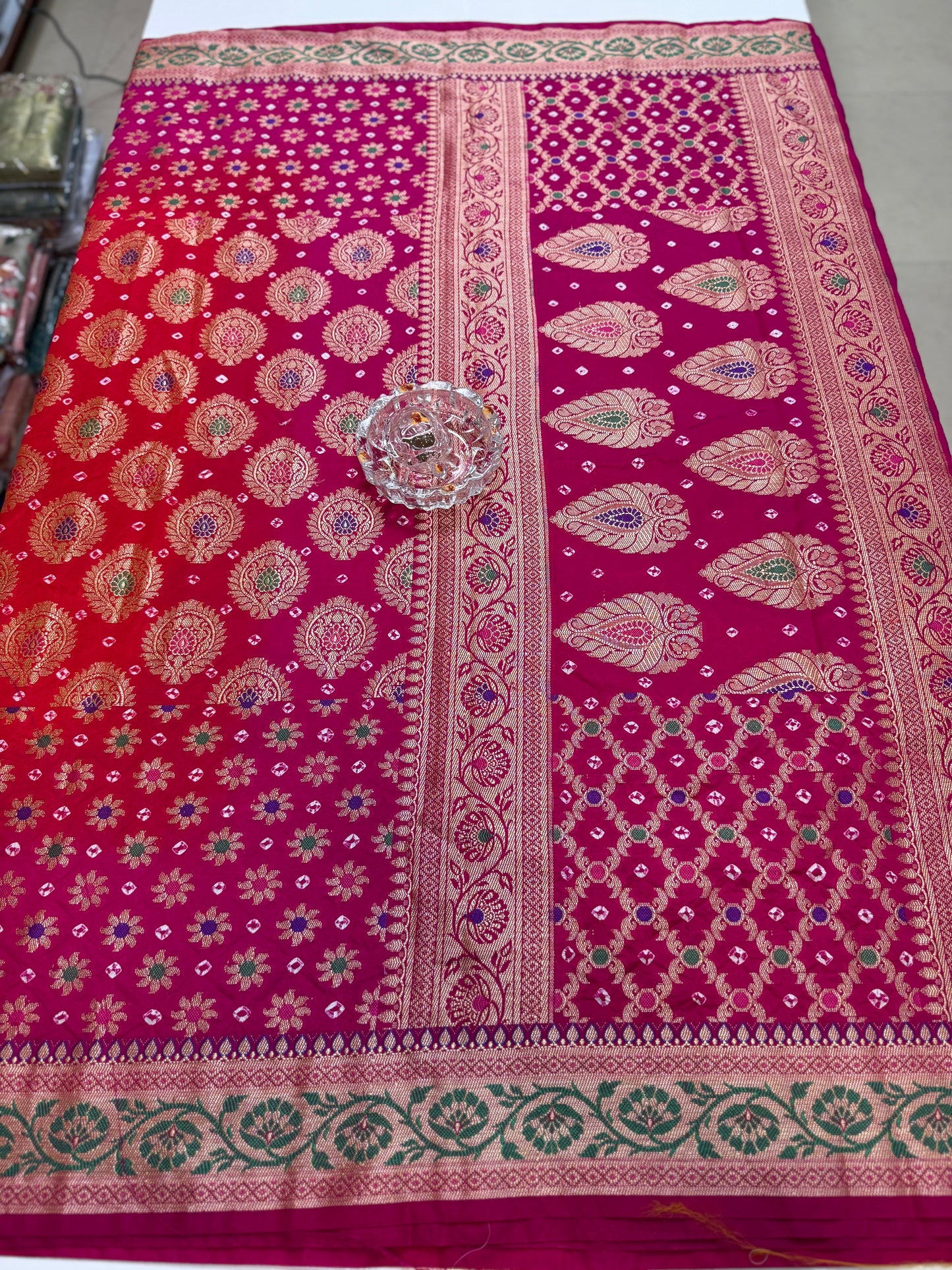 Banarasi dupiyan bandhani saree with semi-weaving neemjari work and hand chunri craftsmanship