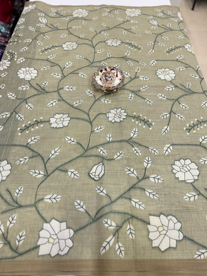 Linen printed saree with floral vine design, contrast border and tassel pallu, women’s daily wear saree