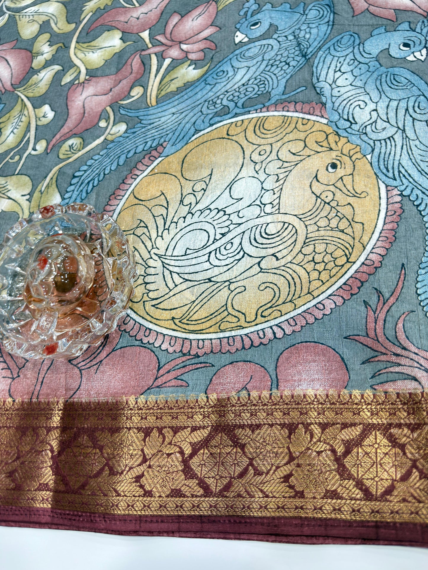 Silk blend printed saree with floral and bird motifs, zari border, women’s festive wear saree