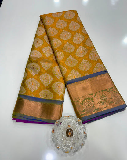 Bridal tissue saree for women with woven zari work and contrast border, kanchipuram style powerloom saree with blouse fabric