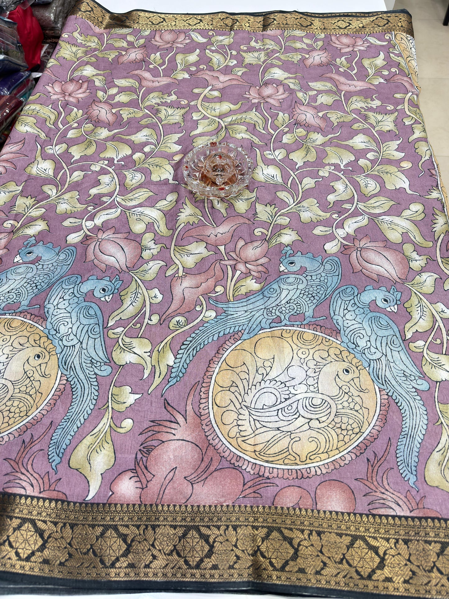 Silk blend printed saree with floral and bird motifs, zari border, women’s festive wear saree
