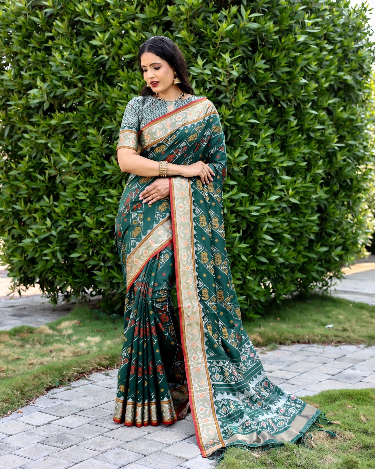 Ikkat Patola Silk Saree with Contrast Zari Weaving and Kanchi Borders – Festive Wear