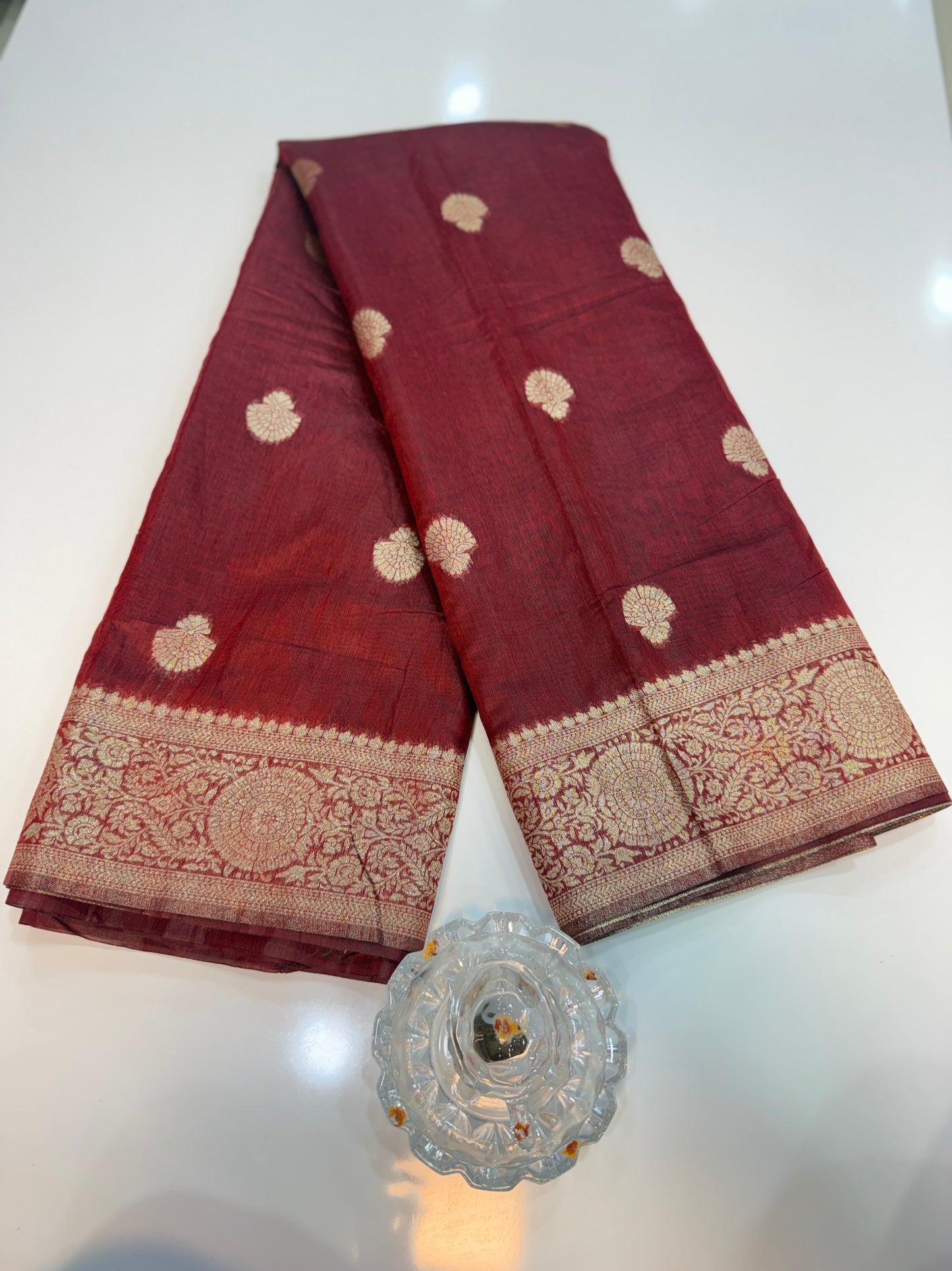 Modal silk saree with woven buttas and peacock pallu for women