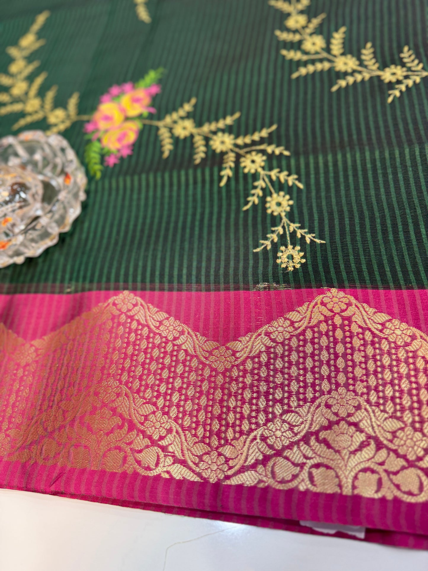 Banarasi kota silk saree with floral embroidery, contrast magenta zari border and matching blouse piece for women