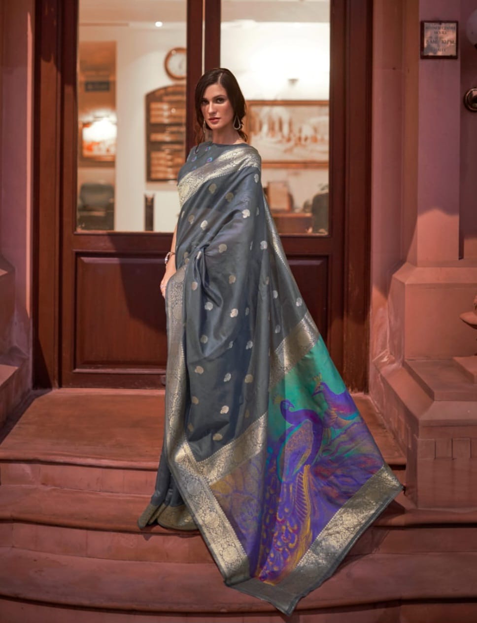 Modal silk saree with woven buttas and peacock pallu for women