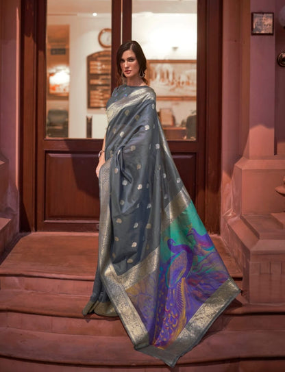 Modal silk saree with woven buttas and peacock pallu for women