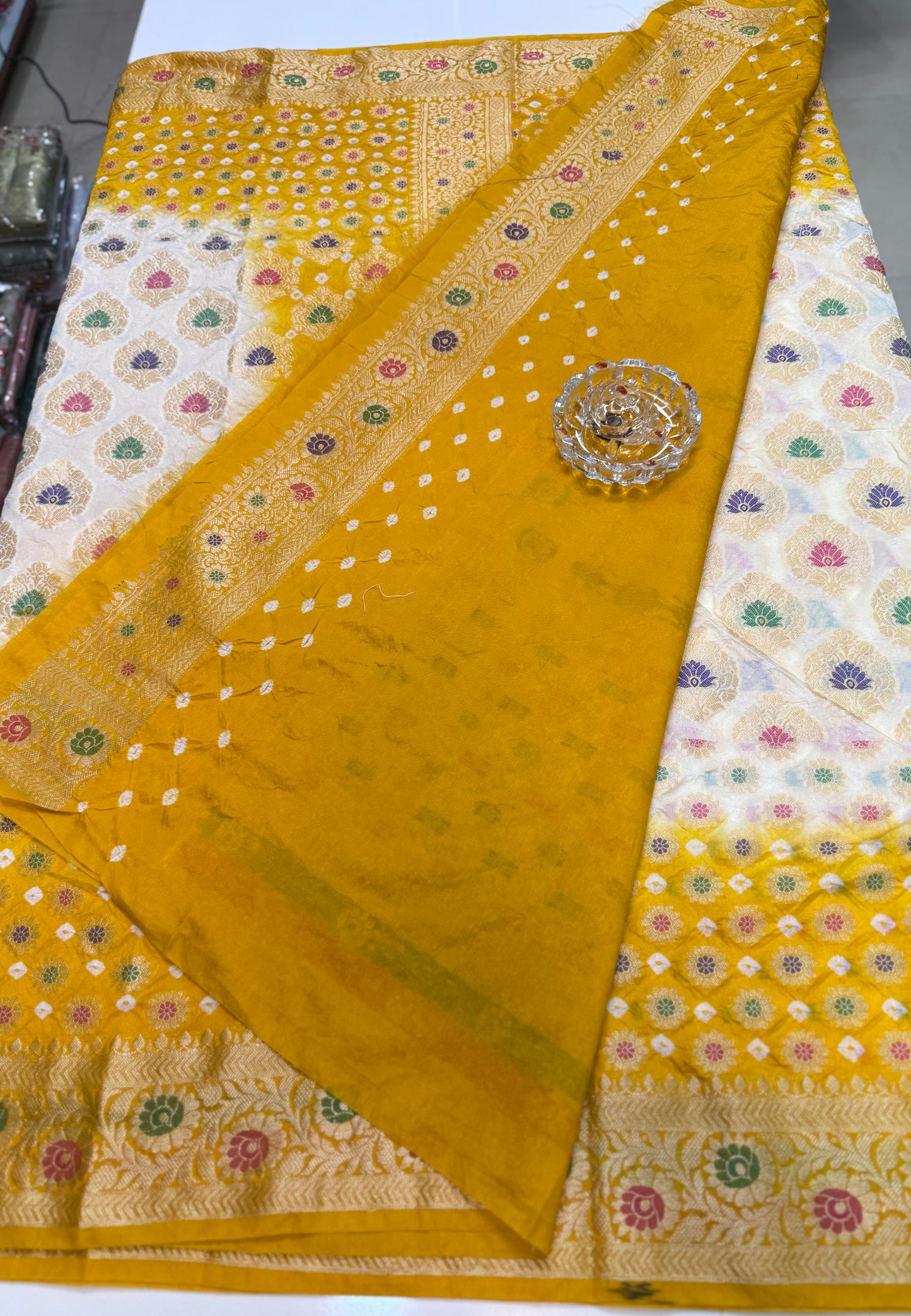 Banarasi dupiyan bandhani saree with semi-weaving neemjari work and hand chunri craftsmanship