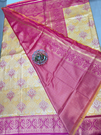 Tissue silk saree with rich zari weaving and contrast border for women