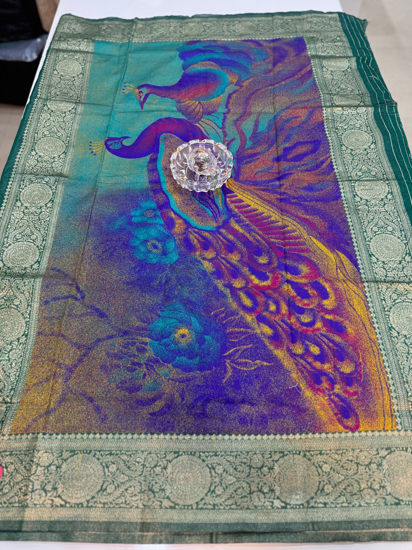 Modal silk saree with woven buttas and peacock pallu for women
