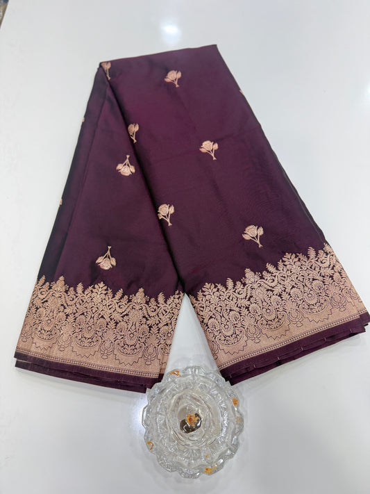 Soft silk saree with woven floral border and contrast brocade blouse piece
