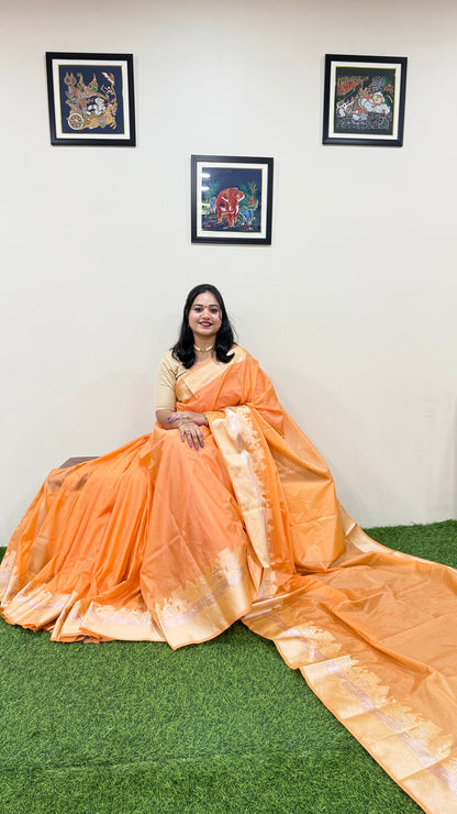 Banarasi warm silk saree with traditional ghat border weaving for festive and wedding occasions