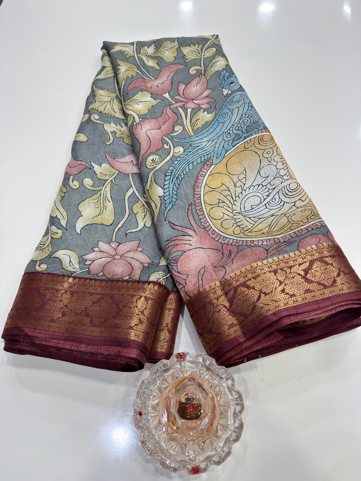 Silk blend printed saree with floral and bird motifs, zari border, women’s festive wear saree