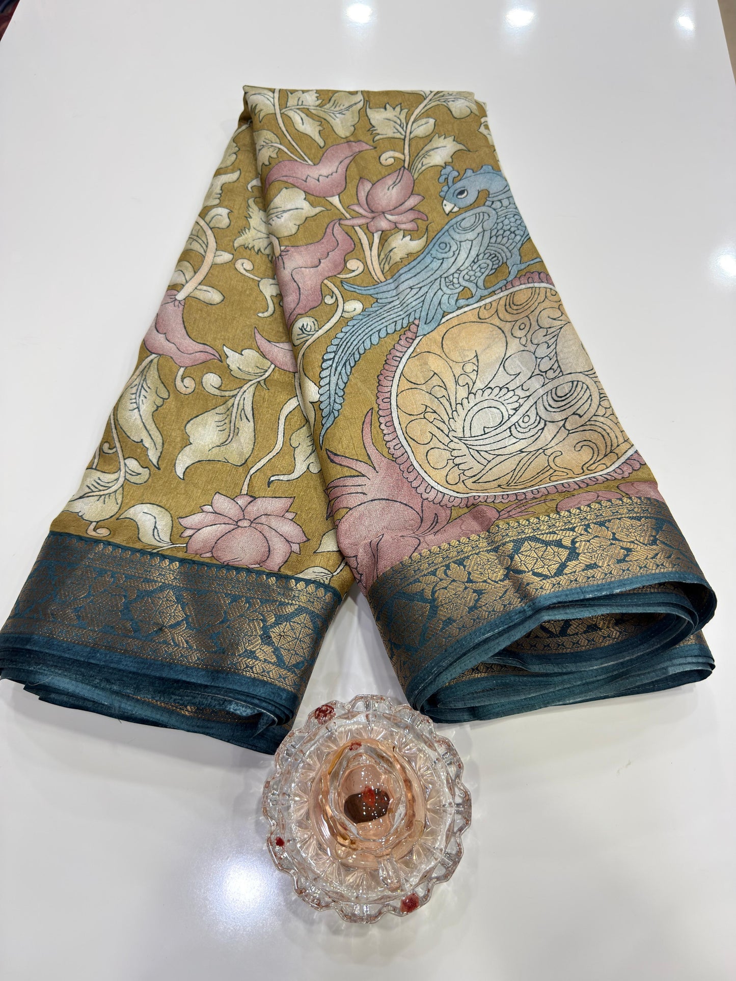 Silk blend printed saree with floral and bird motifs, zari border, women’s festive wear saree